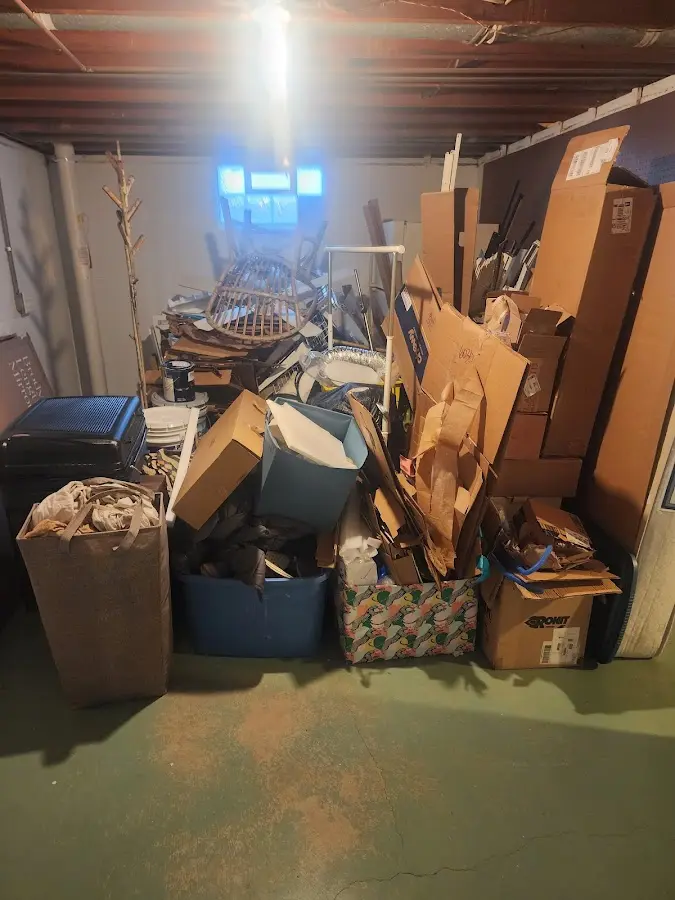 Roll-off dumpster container at job site for 4 Yard Dumpster Rental in Brighton